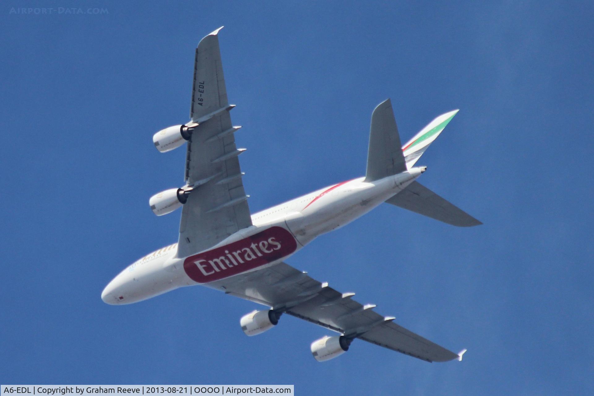 A6-EDL, 2010 Airbus A380-861 C/N 046, High above London City Airport.