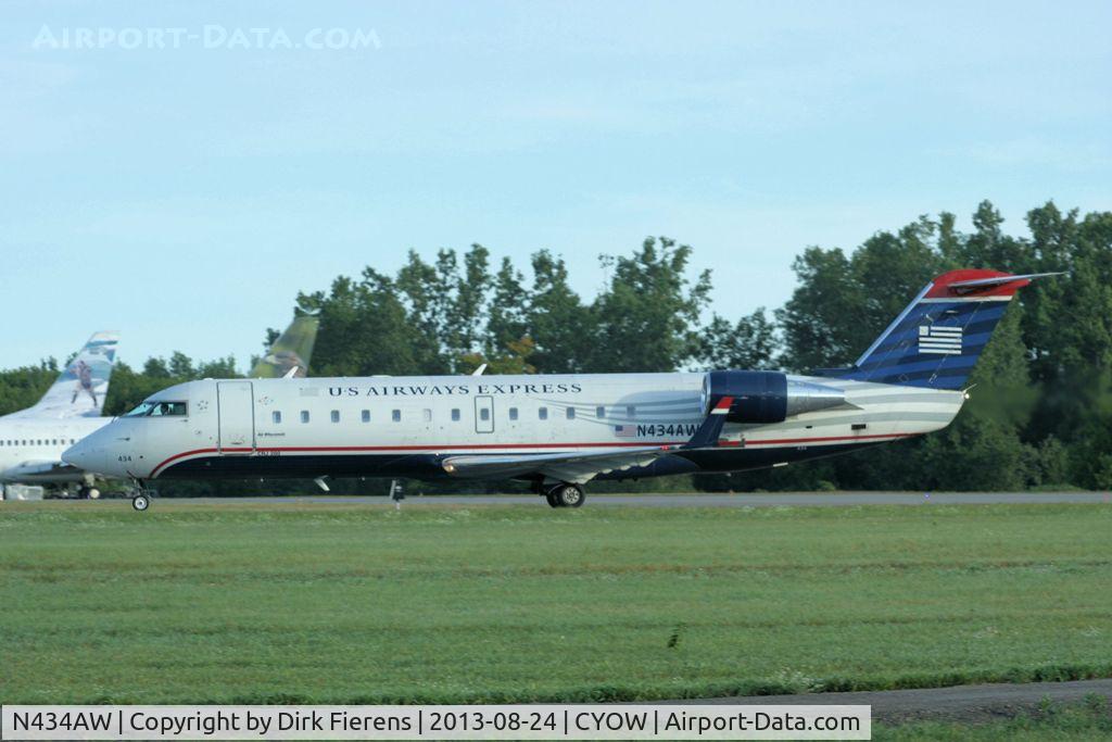 N434AW, 1999 Bombardier CRJ-200ER (CL-600-2B19) C/N 7322, Leaving rwy 25.