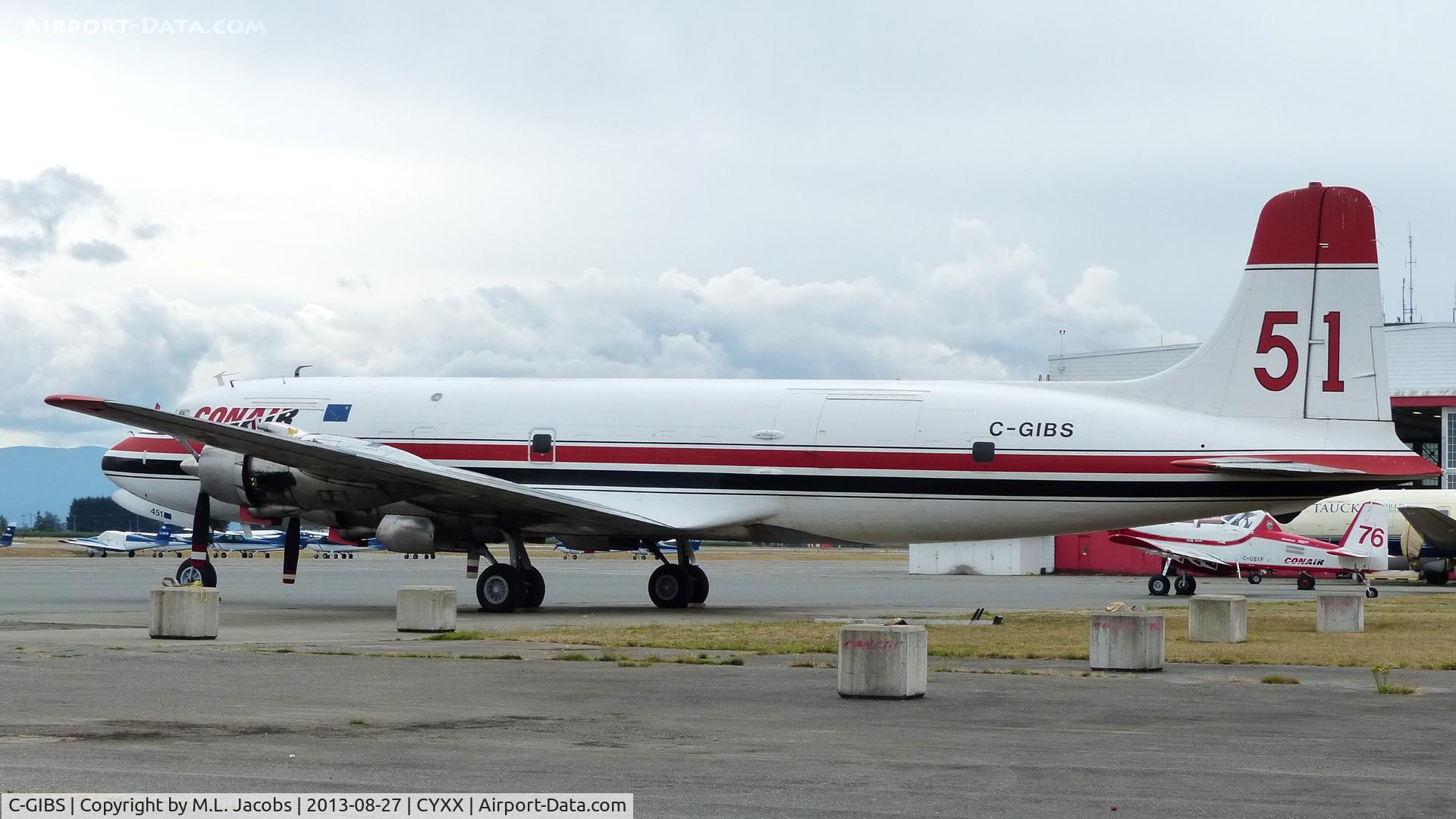 C-GIBS, 1958 Douglas DC-6B(F) C/N 45531, Conair #51 parked beside the Conair hangar at Abbotsford Airport.