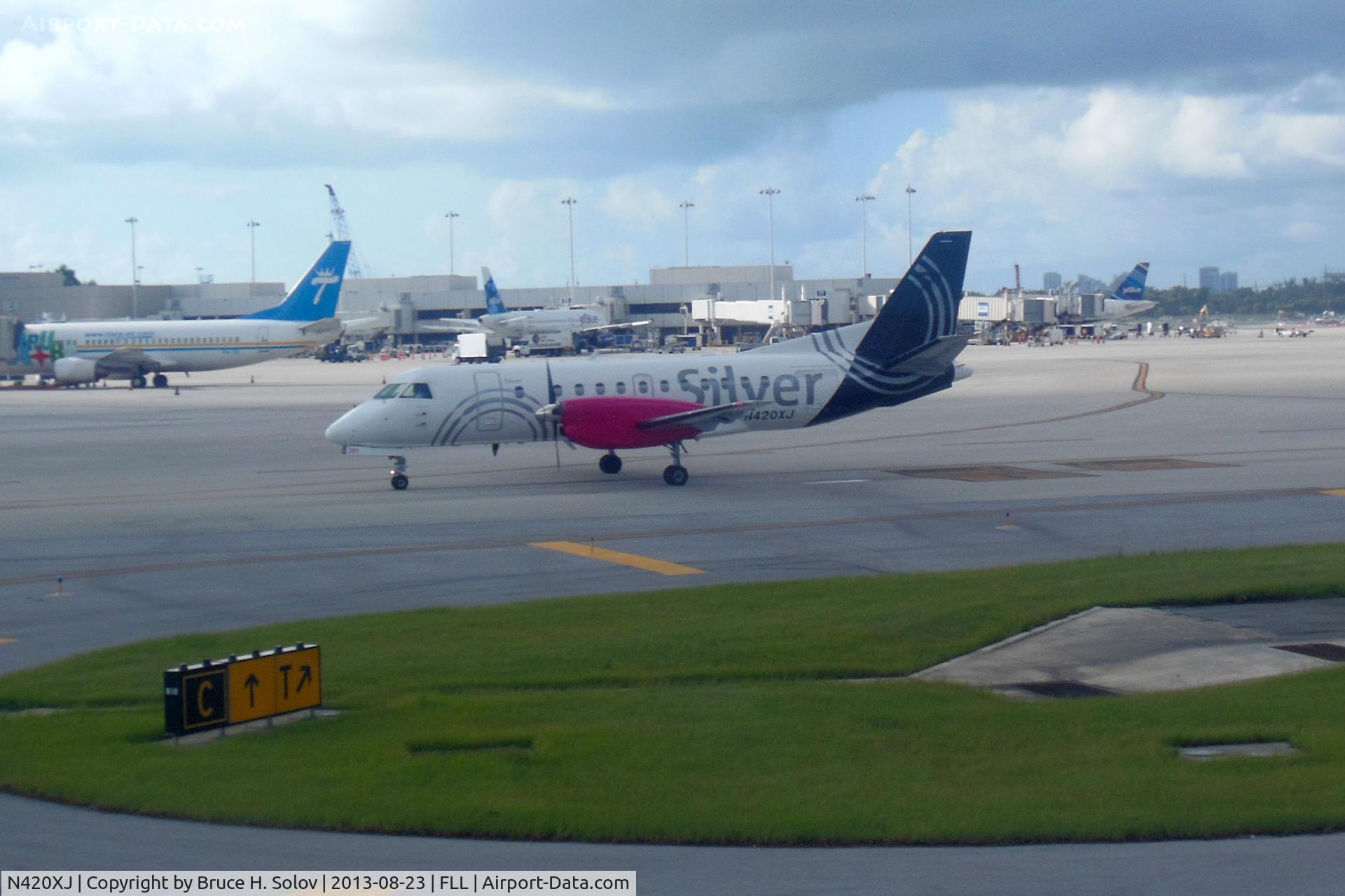 N420XJ, 1997 Saab 340B+ C/N 340B-420, on Taxiway C at FLL