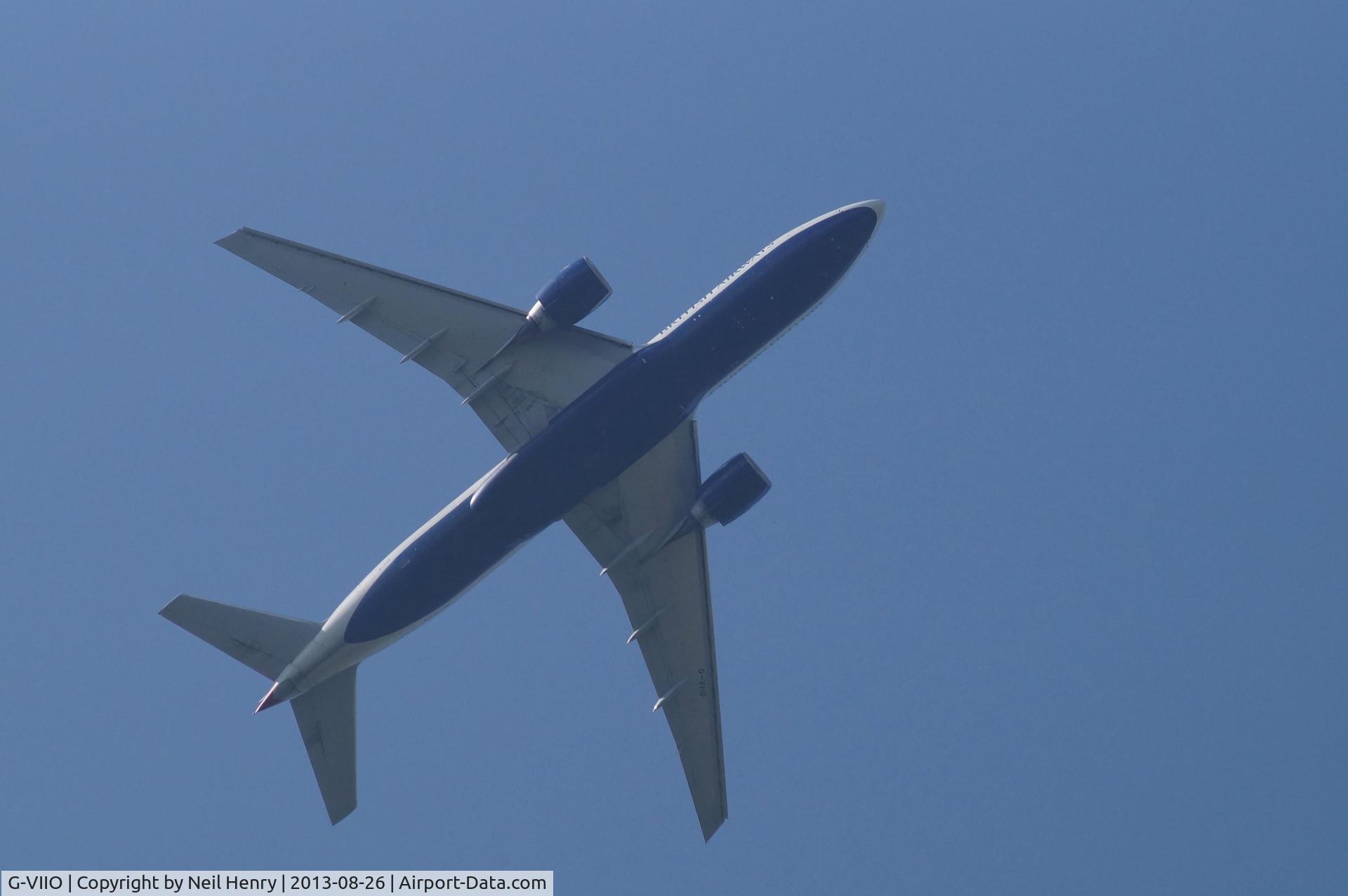 G-VIIO, 1999 Boeing 777-236 C/N 29320, Climbing after take-off eastwards from LGW - over Blindley Heath, Surrey, UK
