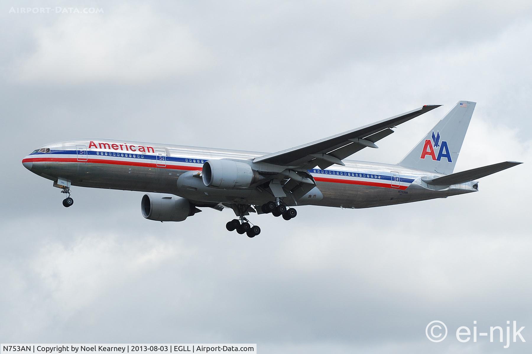 N753AN, 2001 Boeing 777-223 C/N 30261, Photographed landing 27R at Heathrow.