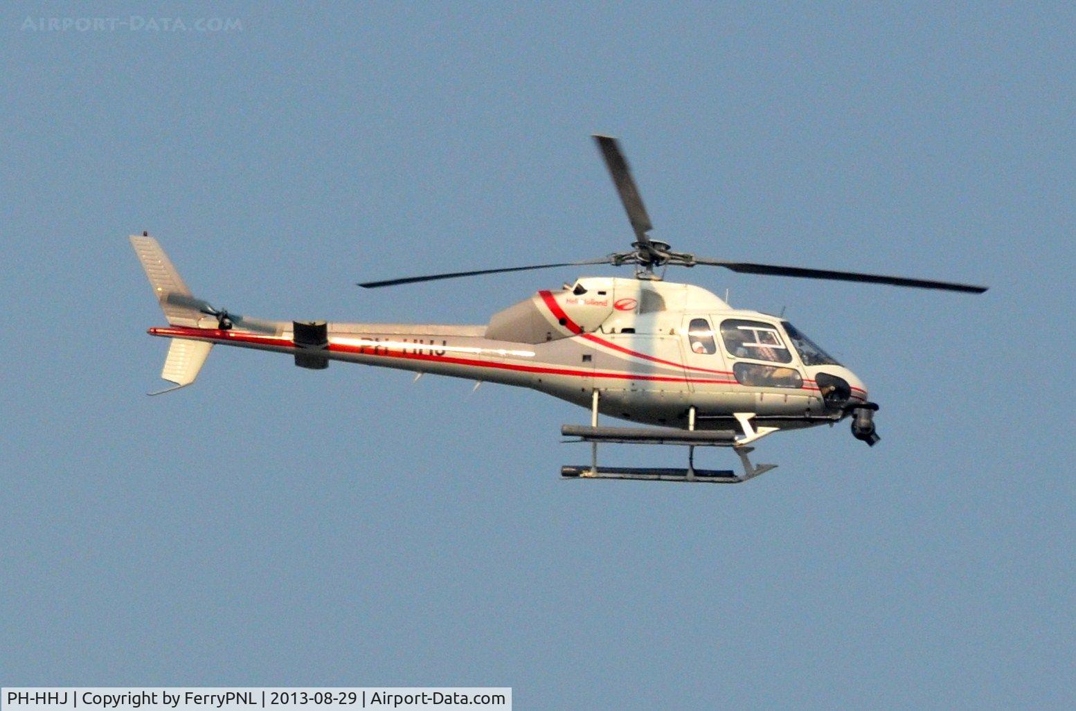 PH-HHJ, Aerospatiale AS-355F-2 Ecureuil 2 C/N 5356, Heli Holland AS355 caught flying over the city of 's-Hertogenbosch, NL.