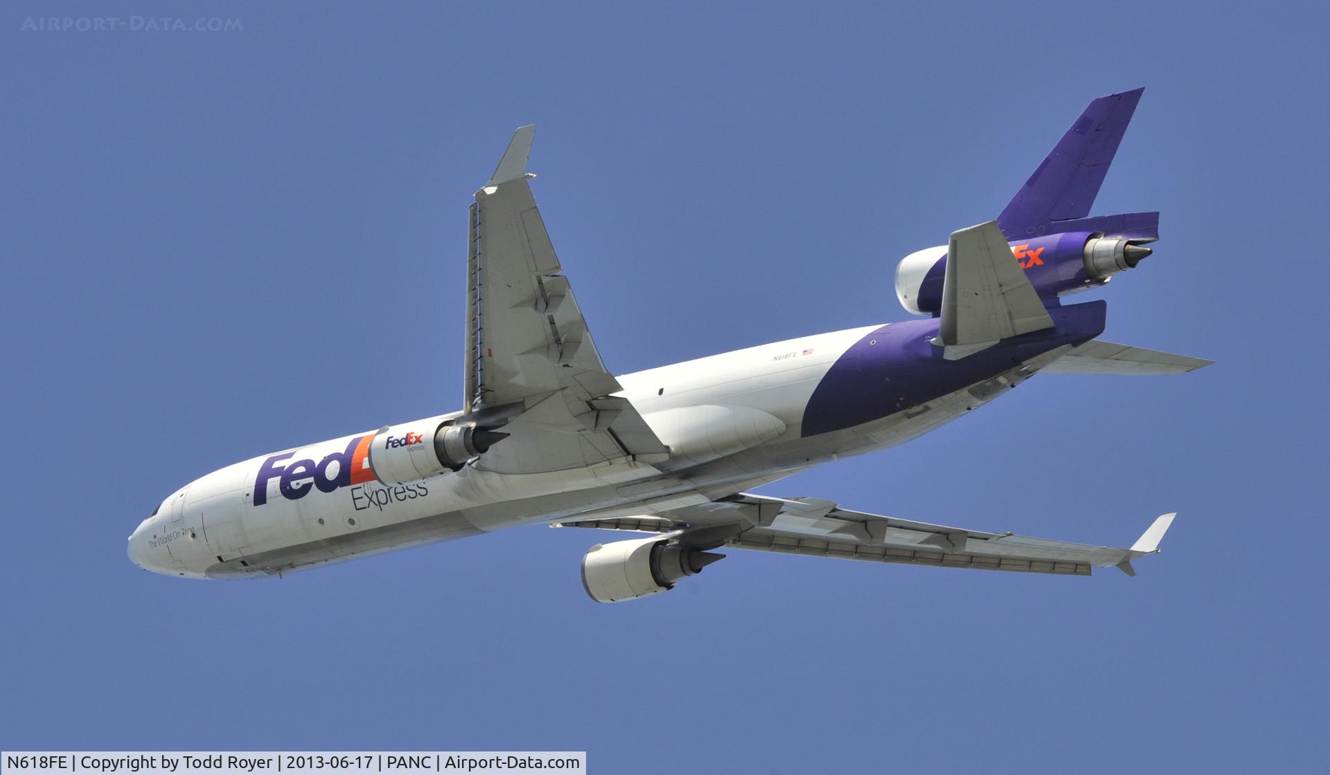 N618FE, 1996 McDonnell Douglas MD-11F C/N 48754, Departing Airventure 2013