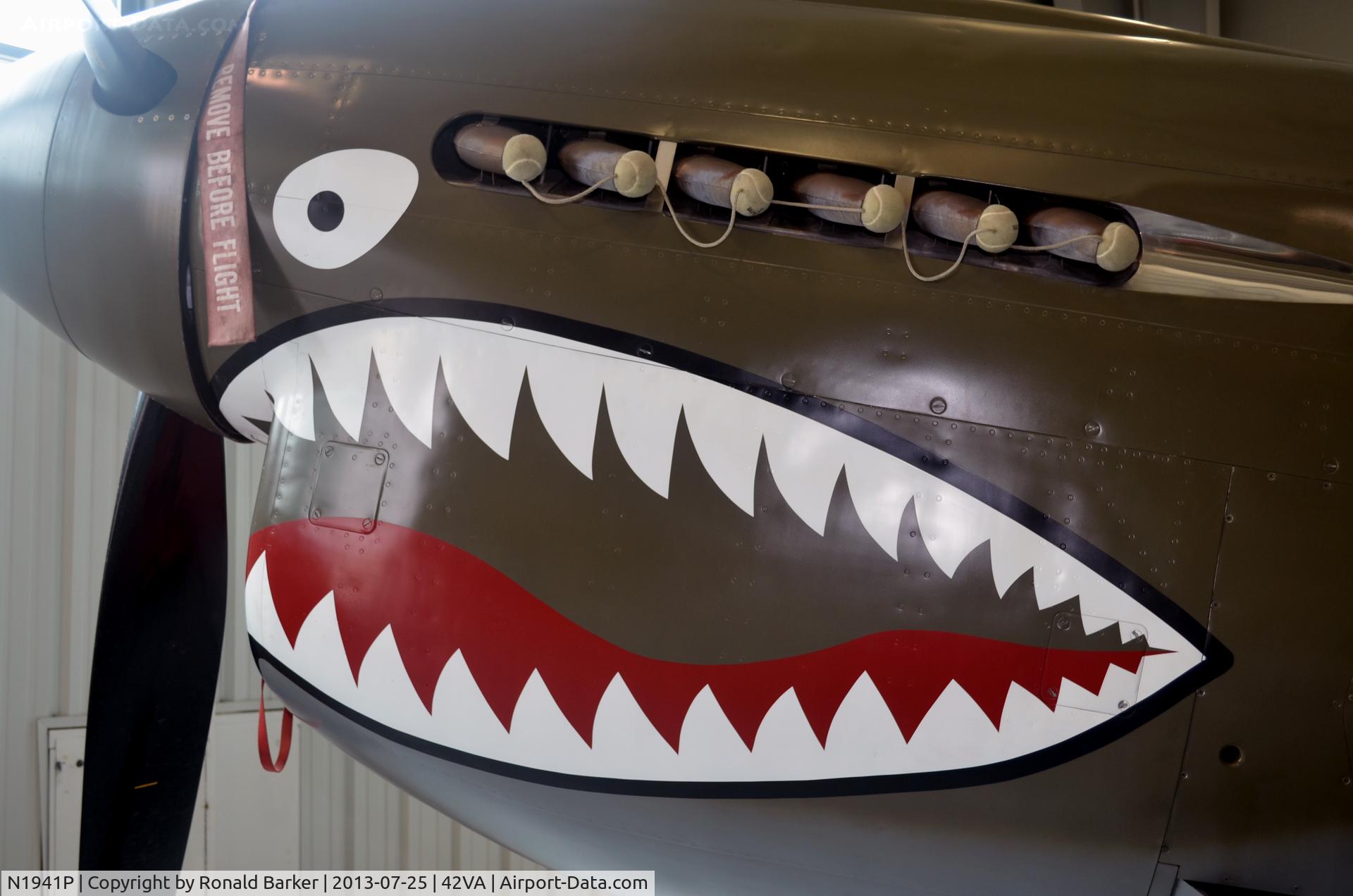 N1941P, 1941 Curtiss P-40E C/N 1025, Check the tennis balls protecting the exhaust ports, Military Aviation Museum, Pungo, VA