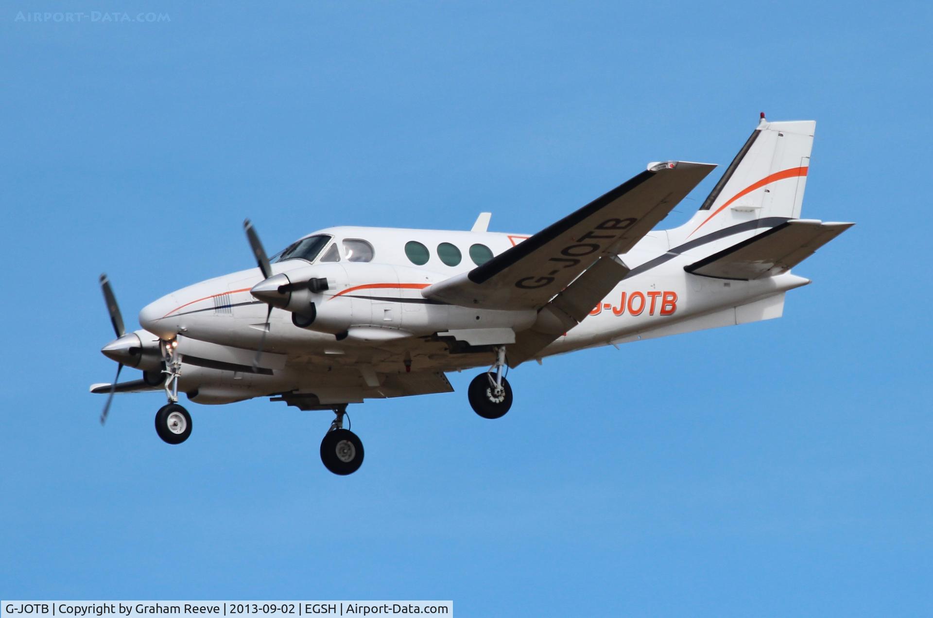 G-JOTB, 1977 Beech C90 King Air C/N LJ-741, About to land at Norwich.