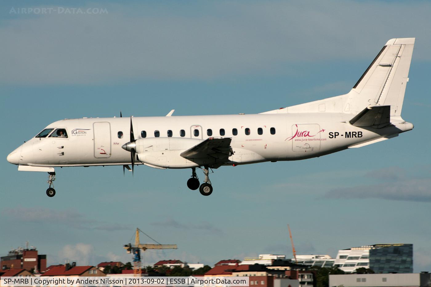 SP-MRB, 1987 Saab SF340A C/N 340A-100, On final for runway 30 on a windy afternoon.