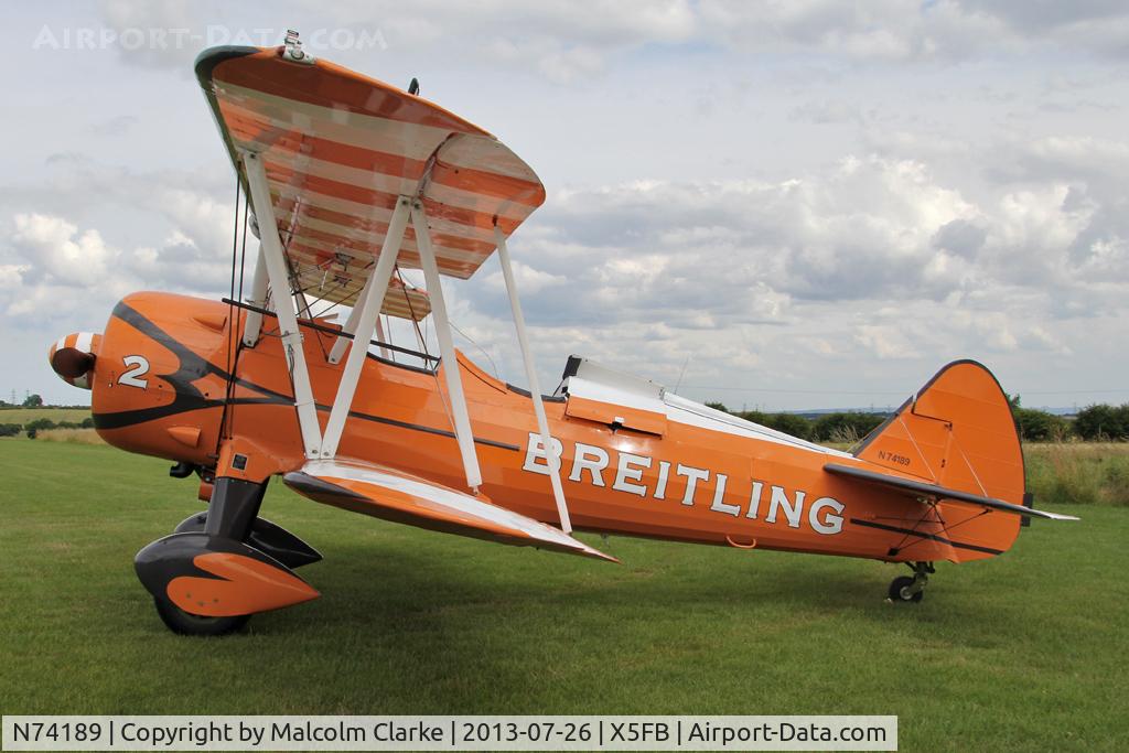 N74189, 1941 Boeing PT-17/R985 Kaydet (A75N1) C/N 75-717, Stearman PT-17-R985 Kaydet (A75N1) during a re-fuelling stop at Fishburn Airfield, July 2013.