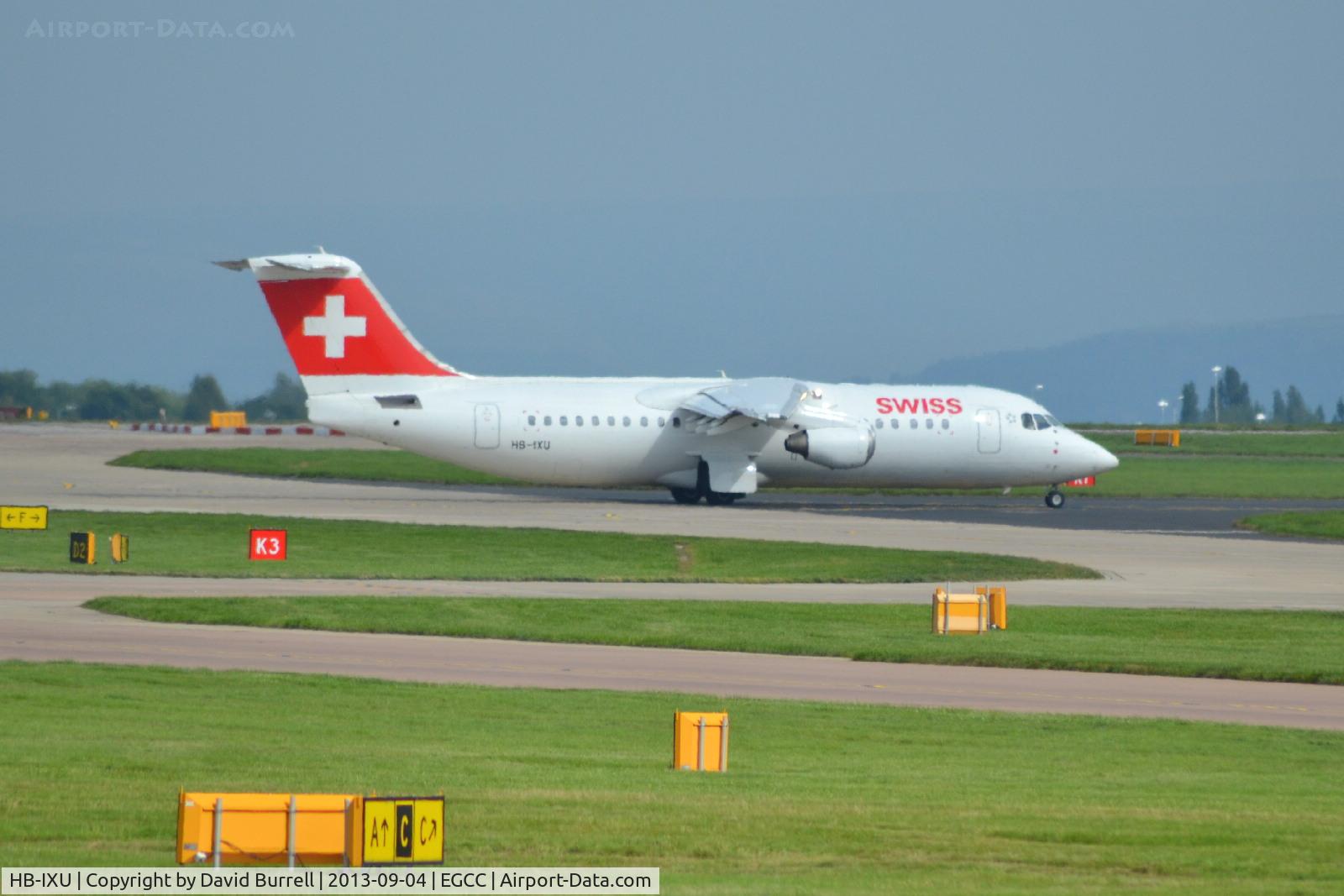 HB-IXU, 1995 British Aerospace Avro 146-RJ100 C/N E3276, Swiss BA Avro 146 RJ-100 taxiing Manchester Airport.