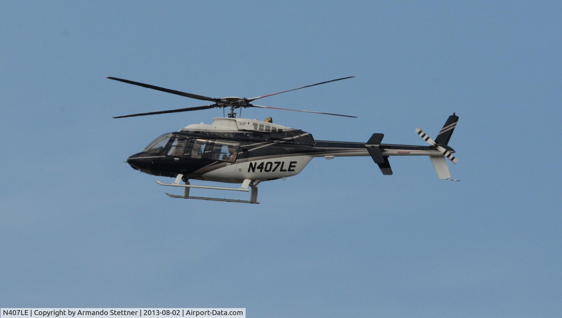 N407LE, 1999 Bell 407 C/N 53391, This aircraft was hovering in the vicinity of the Seattle Space Needle.