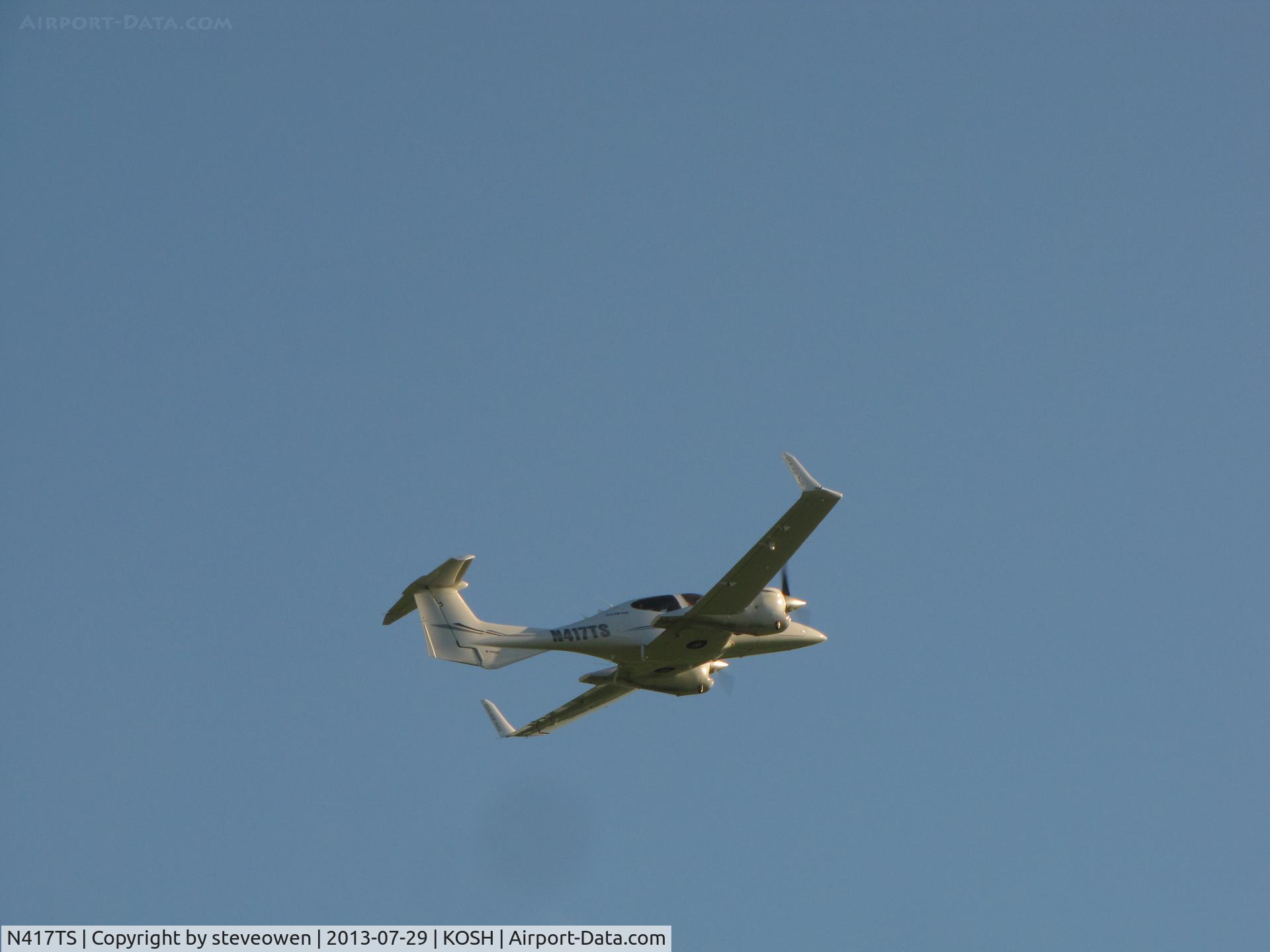 N417TS, 2006 Diamond DA-42 Twin Star C/N 42.AC017, leaving Oshkosh