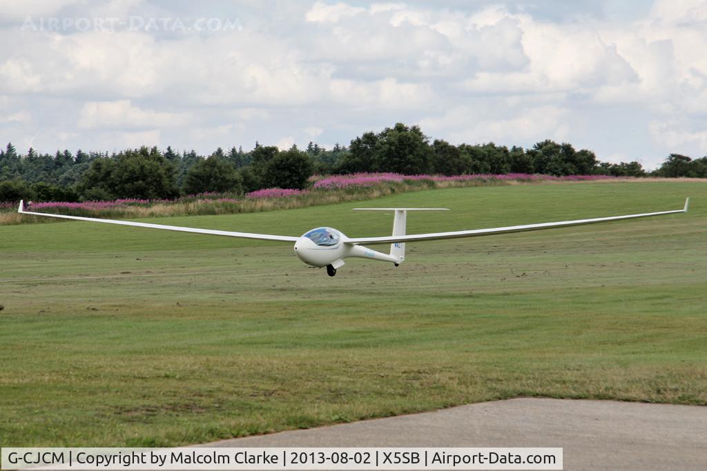G-CJCM, 1997 Schleicher ASW-7 C/N 27064, Schleicher ASW-27 being launched for a cross country flight during The Northern Regional Gliding Competition, Sutton Bank, North Yorks, August 2nd 2013.