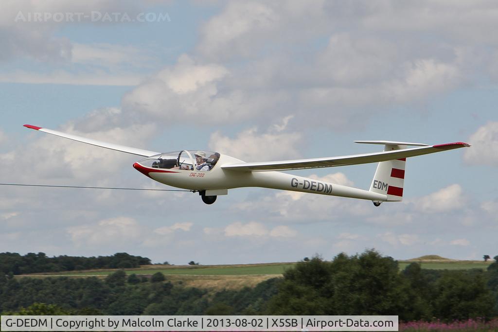 G-DEDM, 1980 Glaser-Dirks DG-200 C/N 2-98, Glaser-Dirks DG-200 being launched for a cross country flight during The Northern Regional Gliding Competition, Sutton Bank, North Yorks, August 2nd 2013.