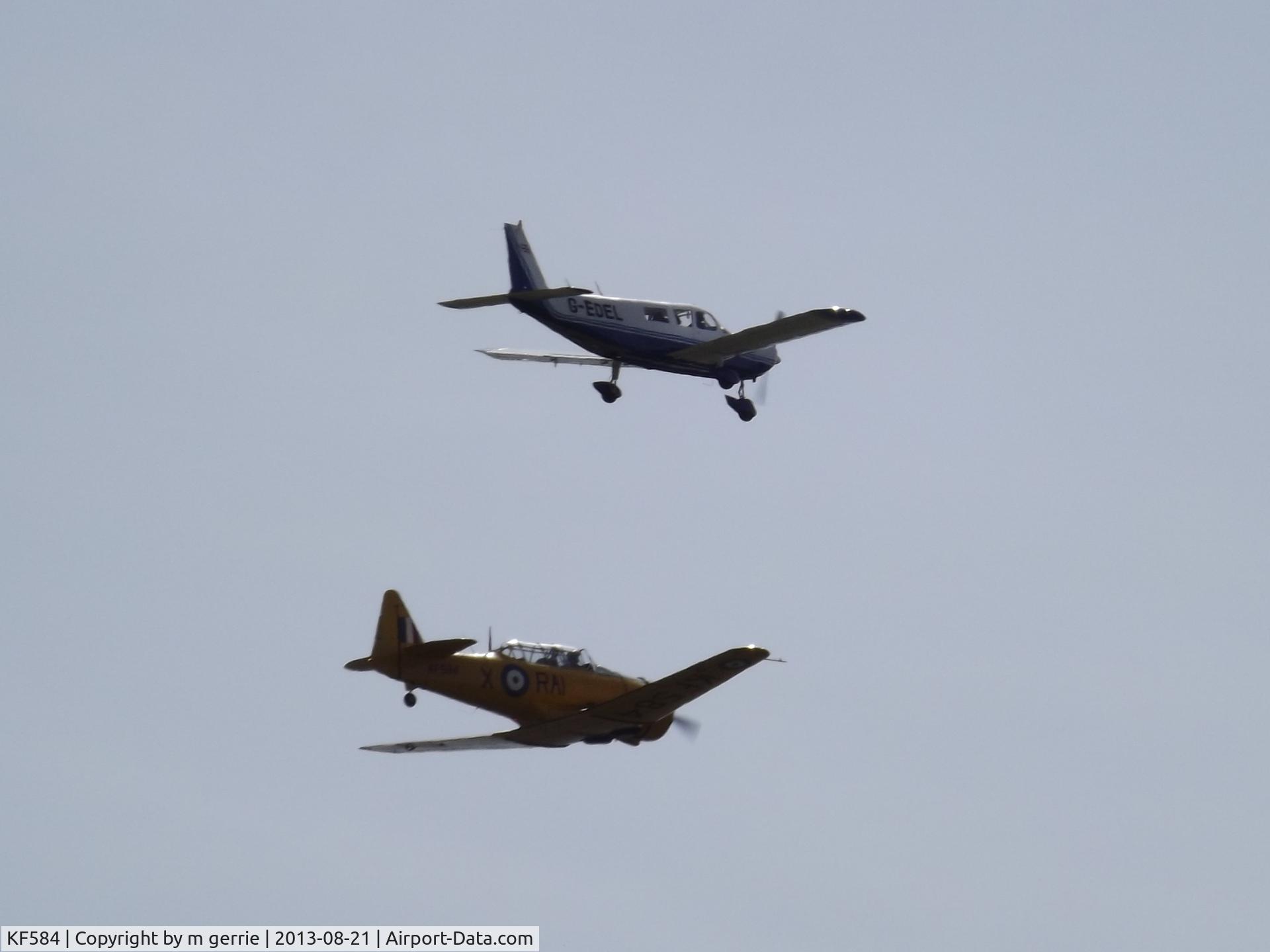 KF584, 1953 Canadian Car & Foundry T-6H Harvard Mk.4M C/N CCF4-409, slow fly by with another
