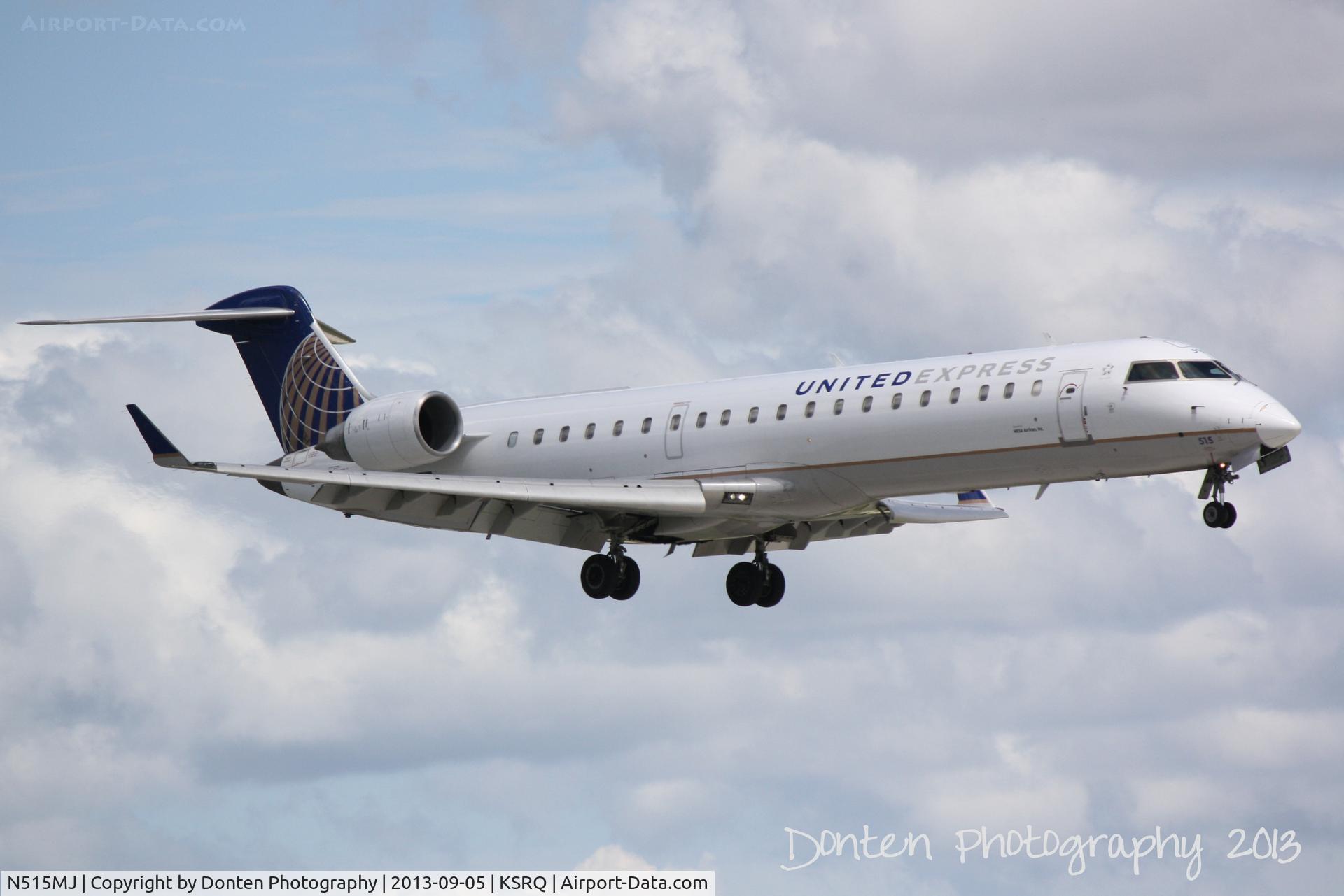 N515MJ, 2003 Bombardier CRJ-700 (CL-600-2C10) Regional Jet C/N 10117, United Flight 3751 operated by Mesa (N515MJ) arrives at Sarasota-Bradenton International Airport following a flight from Chicago-O'Hare International Airport