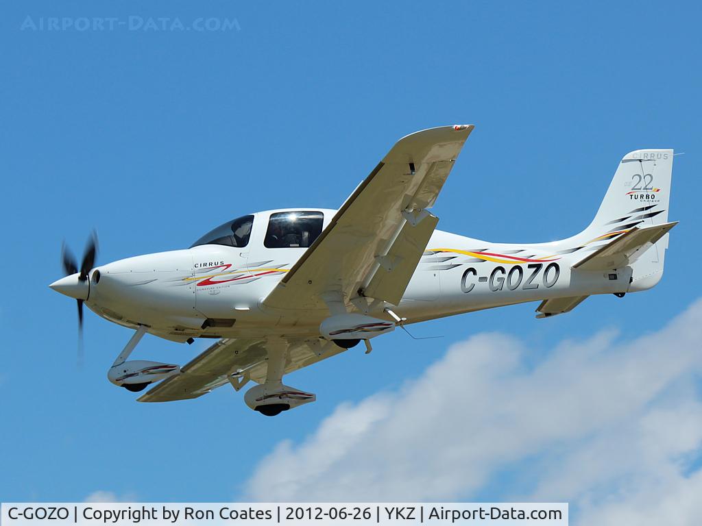 C-GOZO, 2006 Cirrus SR22 Turbo C/N 2228, Attractive looking Cirrus SR22 landing on rwy 33 at Buttonville Municipal Airport