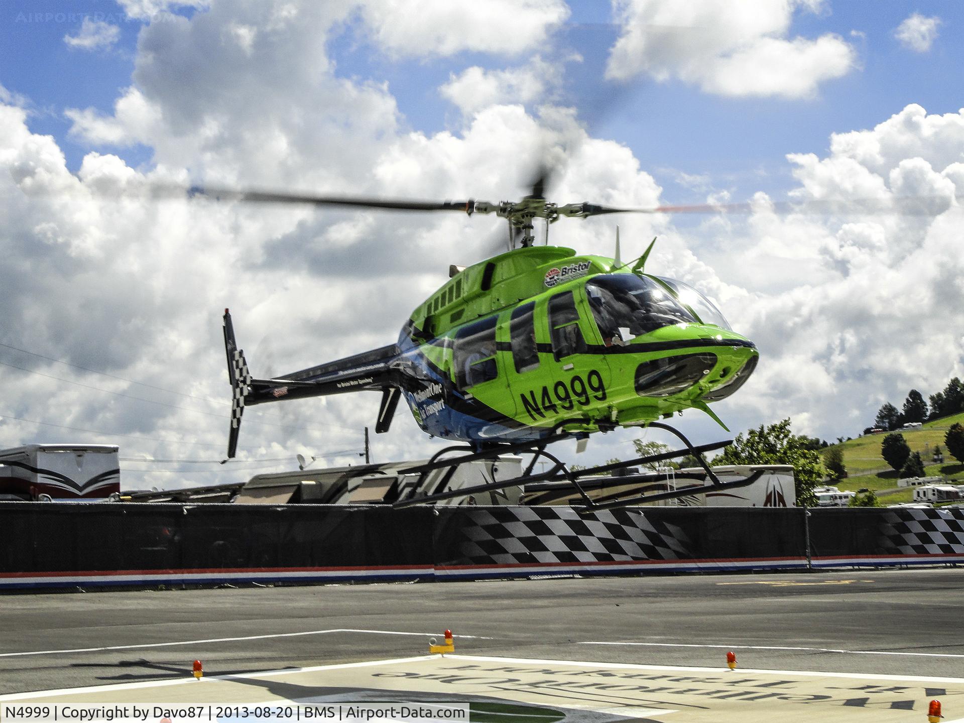 N4999, 1998 Bell 407 C/N 53323, Wellmont One Air Transport touches down at the Bristol Motor Speedway helipad.