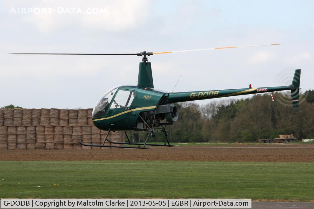 G-DODB, 1988 Robinson R22 Beta C/N 0911, Robinson R22 Beta at The May-hem Fly-In, Breighton Airfield, May 2013.