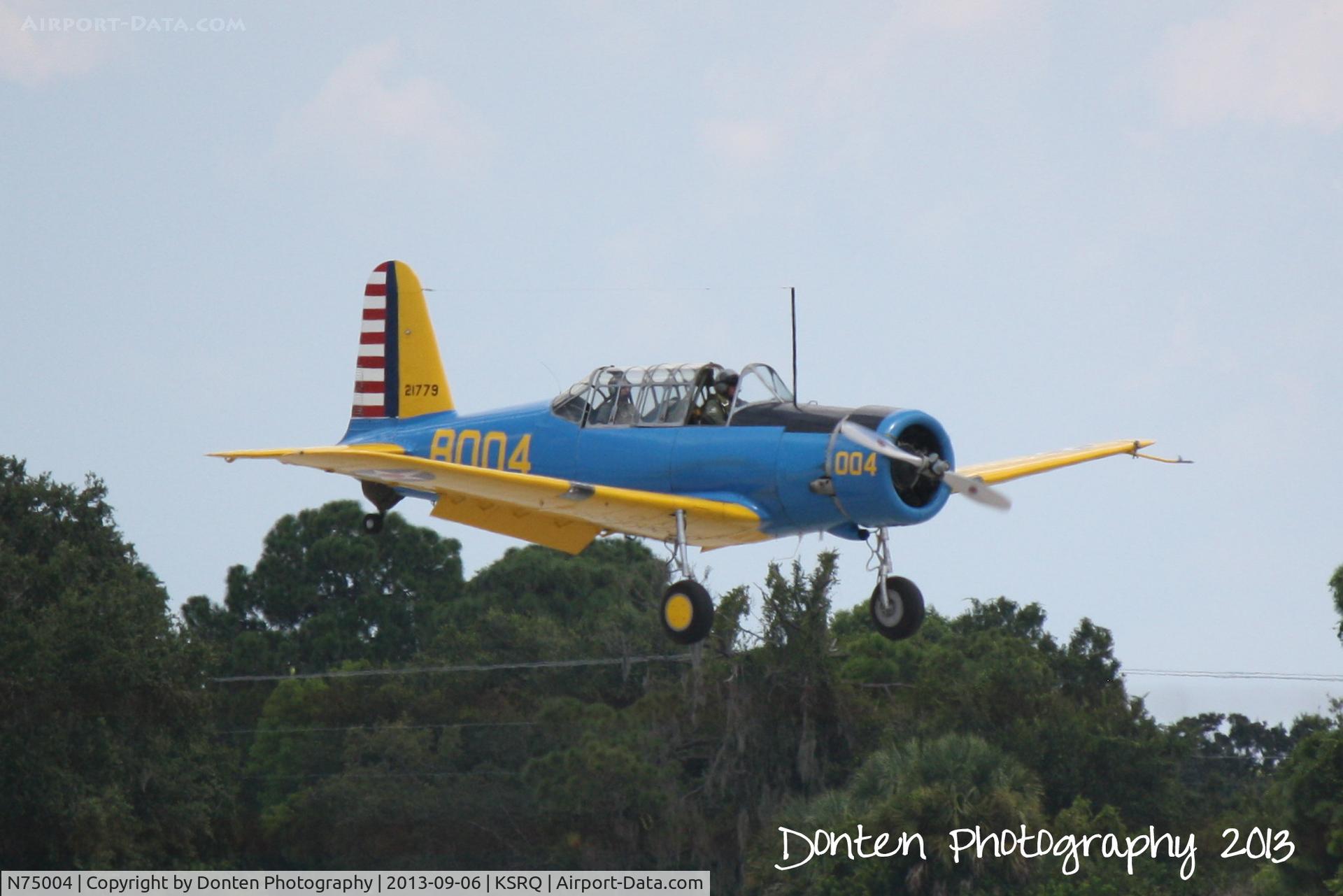 N75004, 1942 Convair BT-15 C/N 6720, Vultee BT-15 Valiant (N75004) arrives at Sarasota-Bradenton International Airport