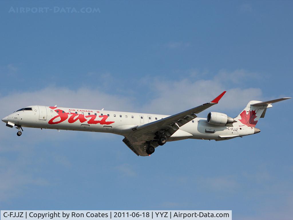C-FJJZ, 2005 Canadair CRJ-705ER (CL-600-2D15) Regional Jet C/N 15043, 2005 Bombardier CL 600 landing on rwy 33L at Toronto Int'l Airport (YYZ)