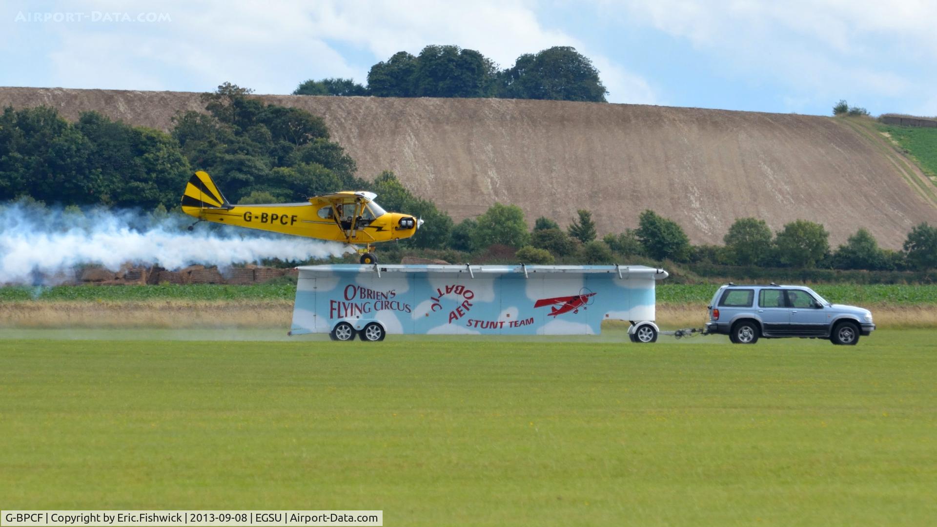 G-BPCF, 1940 Piper J3C-65 Cub Cub C/N 4532, 5. G-BPCF - two wheels down,  at The Duxford Air Show, Sept. 2013.