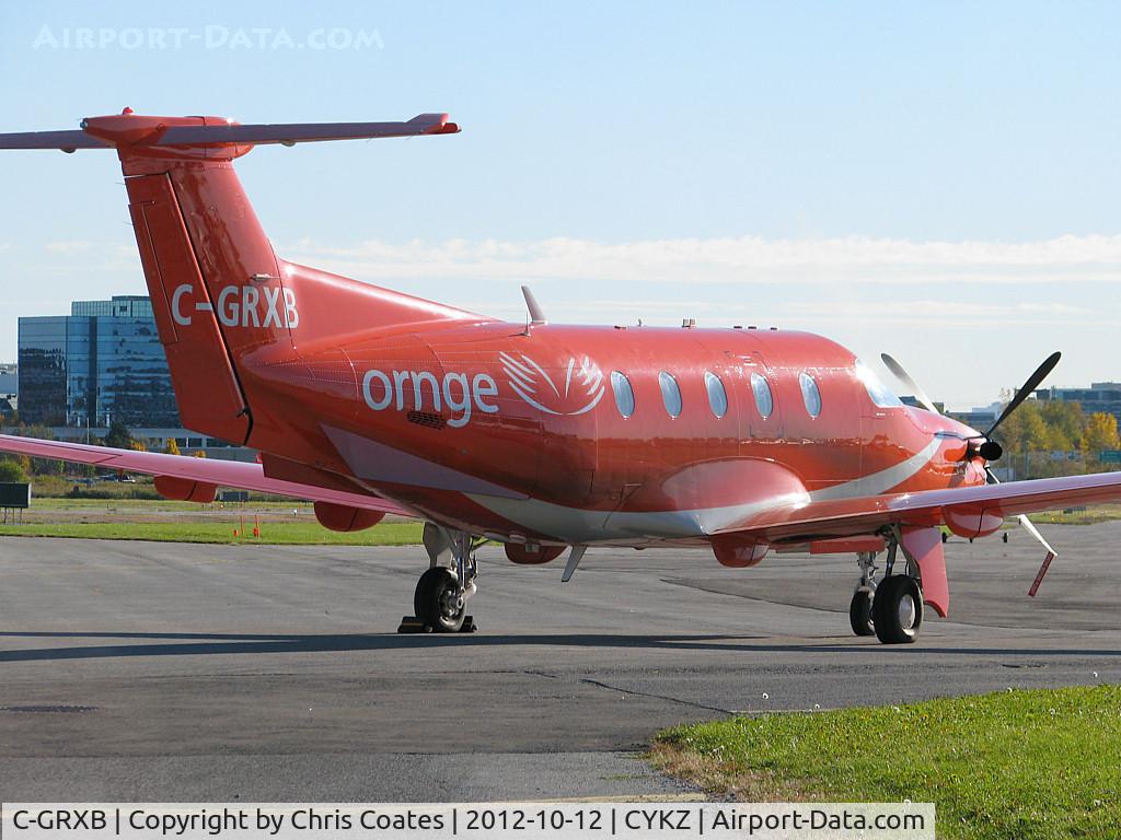 C-GRXB, 2008 Pilatus PC-12/47E C/N 1094, This nice Pilatus with its unique colour was parked on the terminal ramp waiting for its next mission. It's a Medevac plane that's based far up north in Thunder Bay, Ontario.