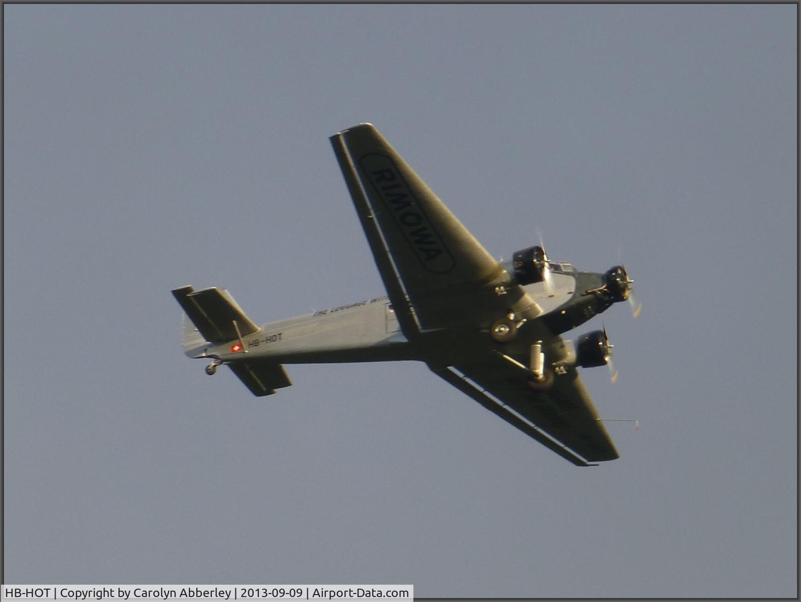 HB-HOT, 1939 Junkers Ju-52/3m g4e C/N 6595, In flight above Maidenhead, UK at c.18:30 9 September 2013.
