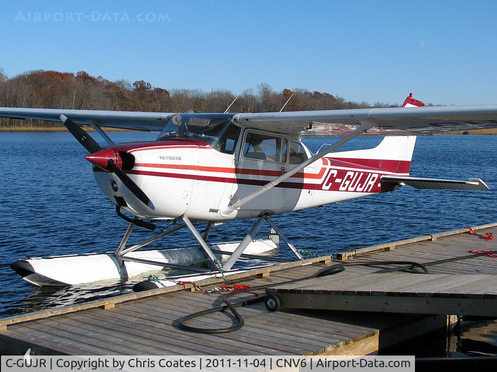 C-GUJR, 1976 Cessna 172M C/N 17267157, After a fun day of flying around over cottage country the two pilots in this Skyhawk stopped here for fuel. This is at Lake St. John Seaplane base that's just north of Orillia, Ontario.