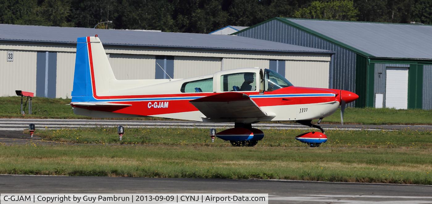 C-GJAM, 1975 American Aviation AA-5 Traveler C/N AA5-0799, On his way to the fuel pumps I think