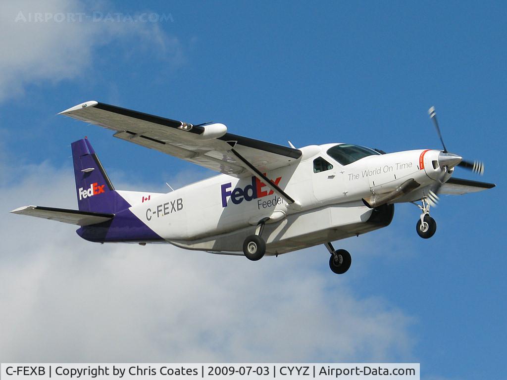 C-FEXB, 1996 Cessna 208B Grand Caravan C/N 208B0539, While fighting strong winds this Caravan was almost over the numbers for runway 23. It was built in 1996 & is owned by Morningstar Air Express of Calgary, Alberta.