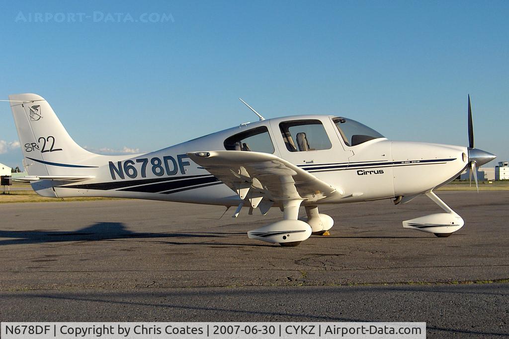 N678DF, 2001 Cirrus SR22 C/N 0125, This nice Cirrus was resting on the Terminal ramp as the sun was sinking low.