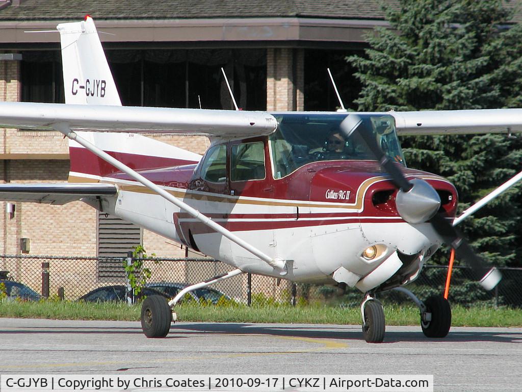 C-GJYB, 1981 Cessna 172RG Cutlass RG C/N 172RG0824, The pilot in this nice burgundy Cutlass RG II was lining up for takeoff on runway 33. His plane lives here & would soon be retracting its gear during initial climbout.