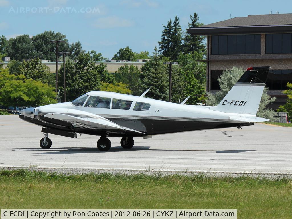 C-FCDI, 1966 Piper PA-30-160 B Twin Comanche C/N 30-1027, Piper Twin Comanche B waits for clearance off rwy 33 at Buttonville Municipal Airport (TKZ) north of Toronto