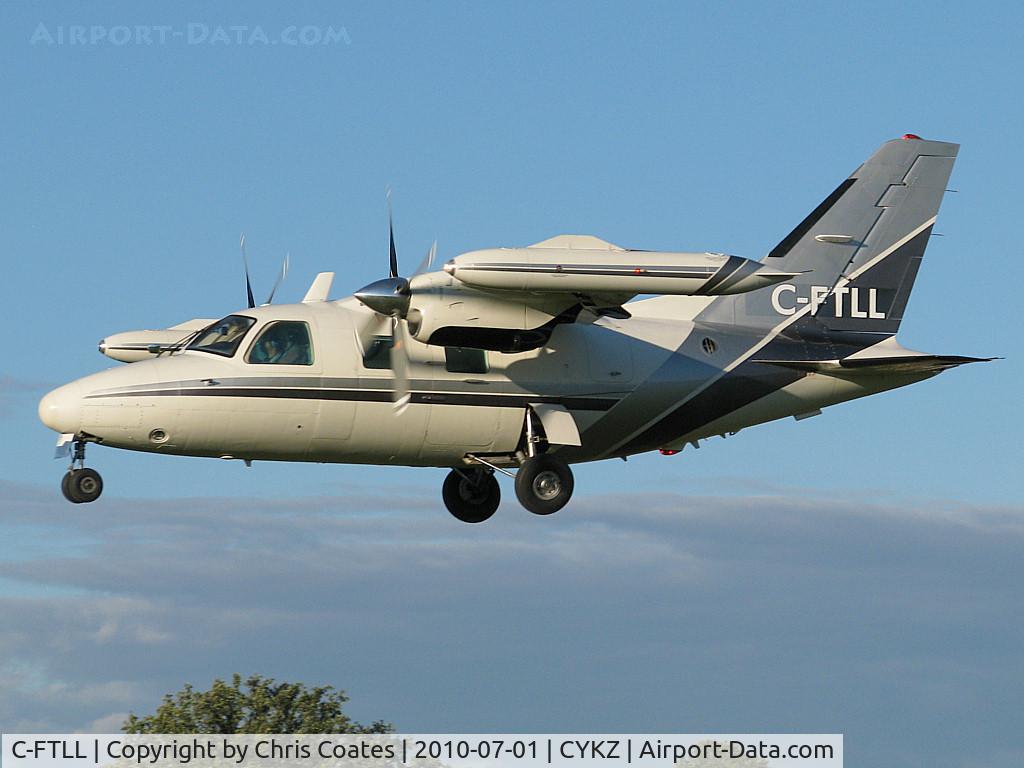 C-FTLL, 1979 Mitsubishi MU-2B-40 Solitaire Solitaire C/N 403SA, This fast tuboprop was on short final for runway 33 on the beautiful day for flying. The garrett engines on this type sure have a loud & unique sound.