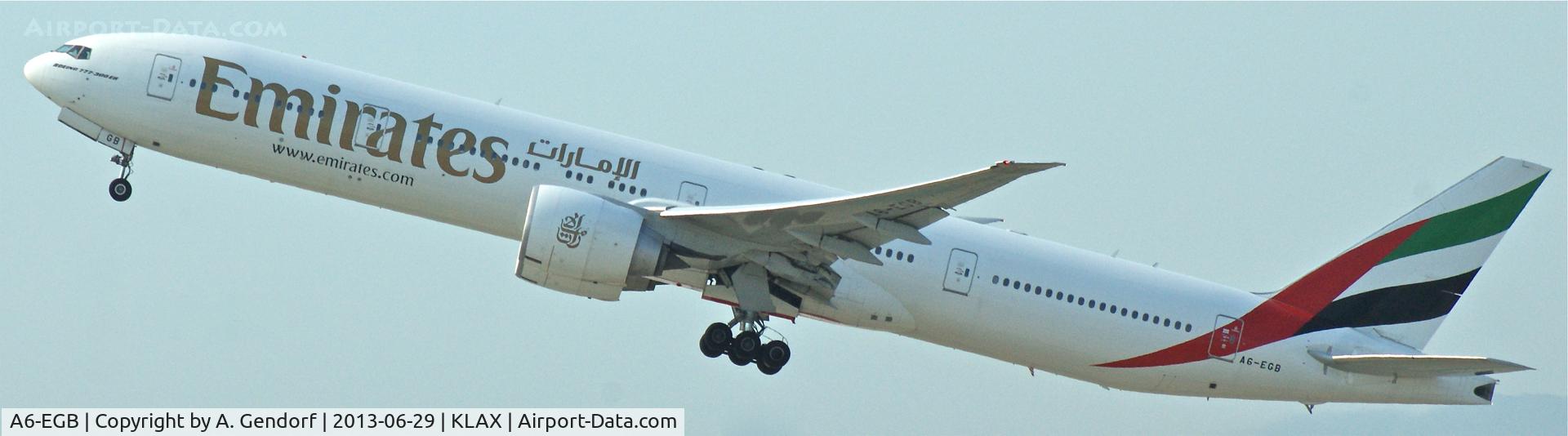 A6-EGB, 2011 Boeing 777-31H/ER C/N 38985, Emirates, seen here climbing out at Los Angeles Int´l(KLAX)