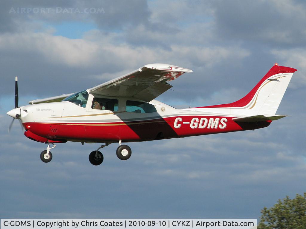 C-GDMS, 1977 Cessna T210M Turbo Centurion C/N 21062013, This gorgeous Centurion was on short final for rwy 33 on this Fall day. I like its new paint with the solid red belly.