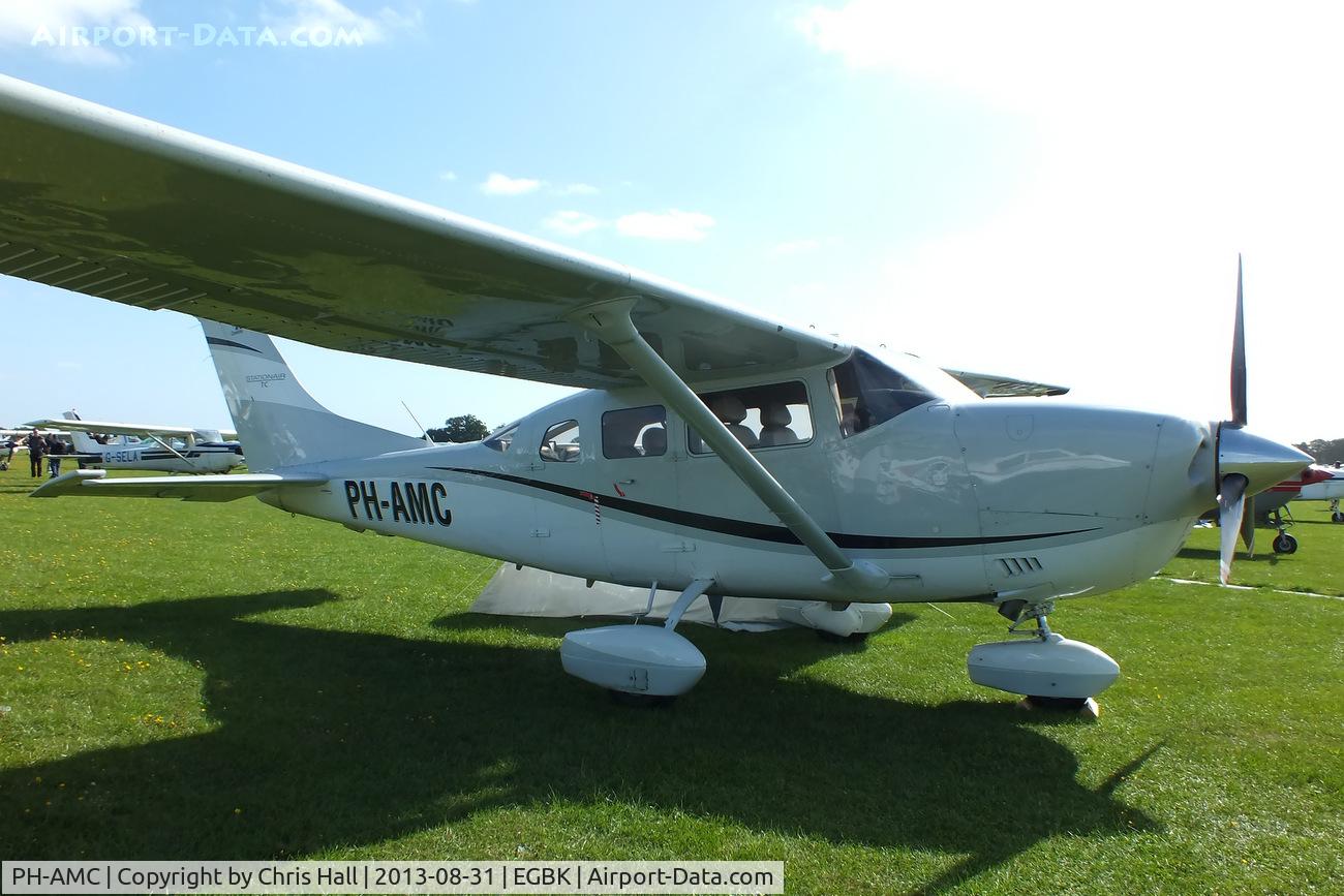 PH-AMC, Cessna T206H Turbo Stationair C/N T20608954, at the LAA Rally 2013, Sywell