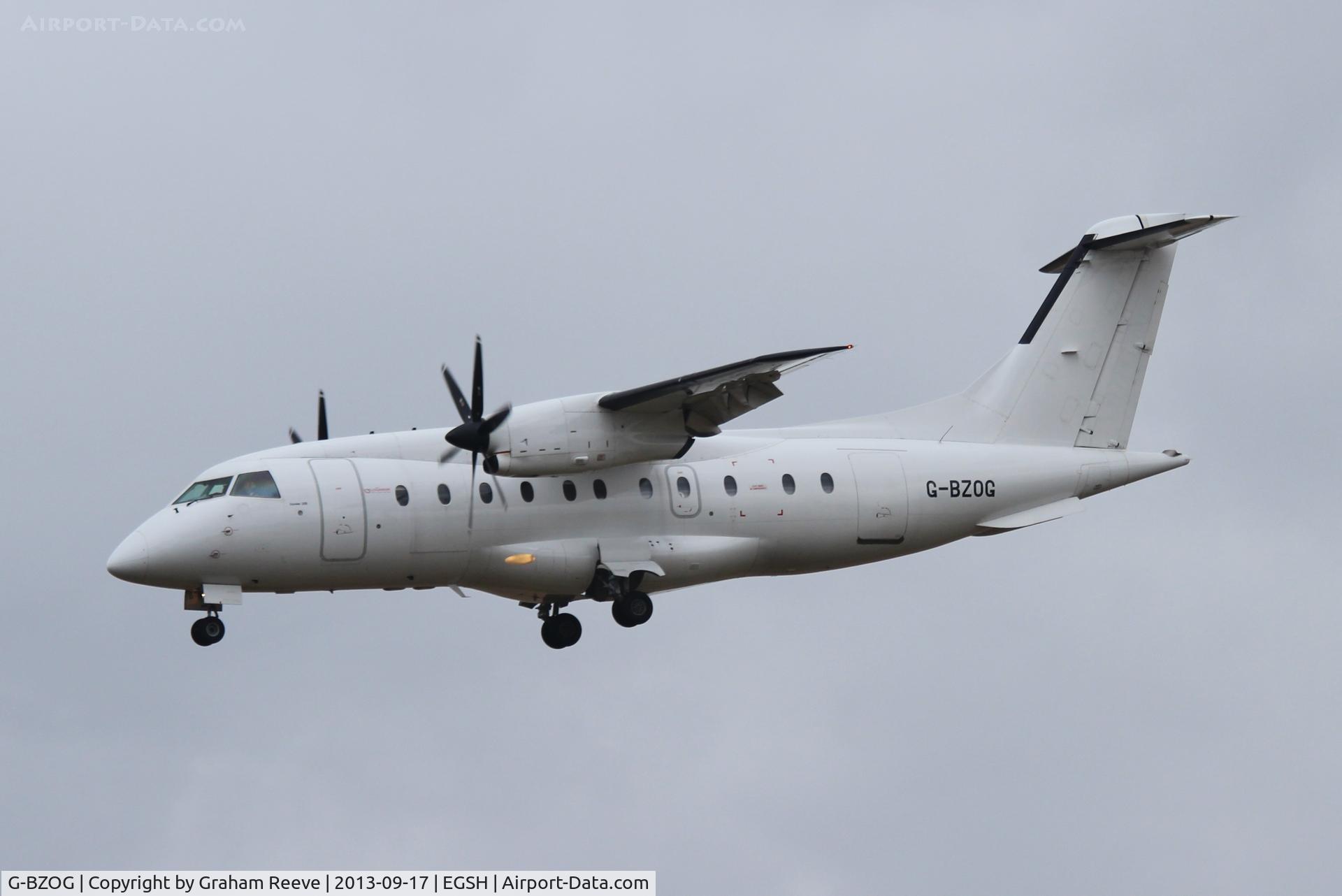 G-BZOG, 1998 Dornier 328-100 C/N 3088, Landing on runway 27 at Norwich.