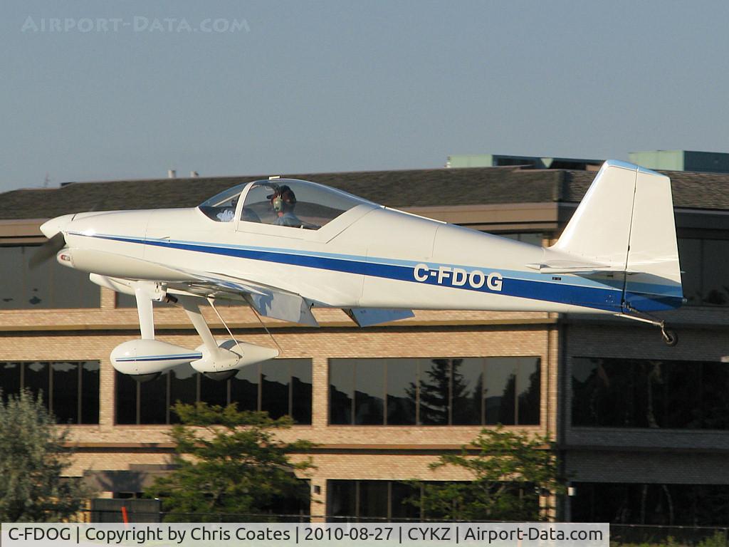 C-FDOG, 1997 Vans RV-6 C/N 22058, This homebuilt plane was gliding over runway 33 before making a soft landing. It was visiting from Belleville Airport (CNU4) that's to the east.