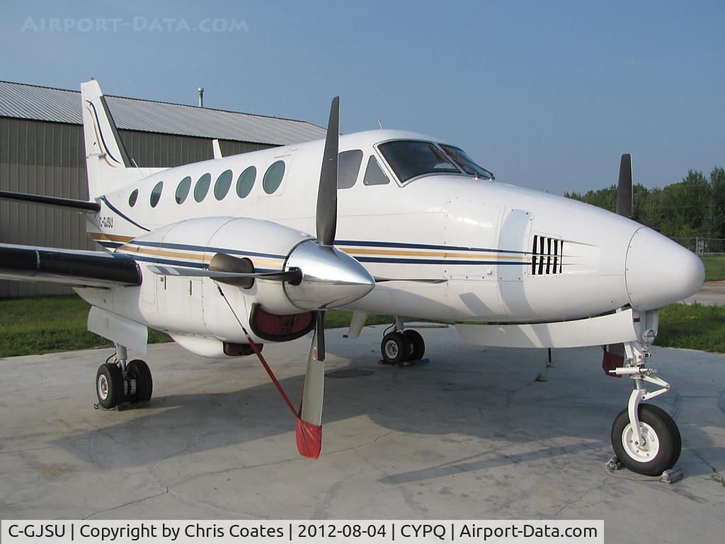 C-GJSU, 1971 Beech 100 King Air C/N B-88, This good looking King Air was resting on its own concrete ramp along Peterborough Airport's east side. It used to live here but has since moved to Quebec.