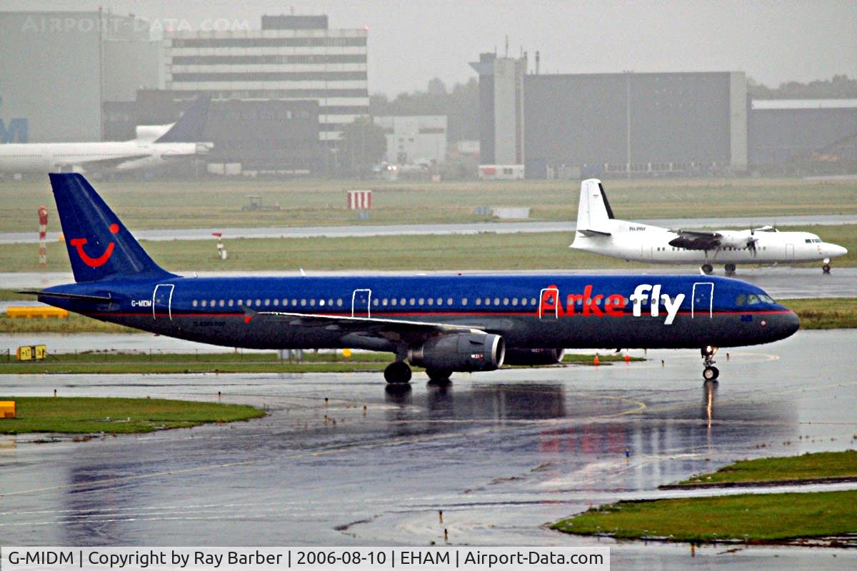 G-MIDM, 2000 Airbus A321-231 C/N 1207, Airbus A321-231 [1207] (Arkefly) Amsterdam-Schiphol~PH 10/08/2006. Taken in a rain storm.