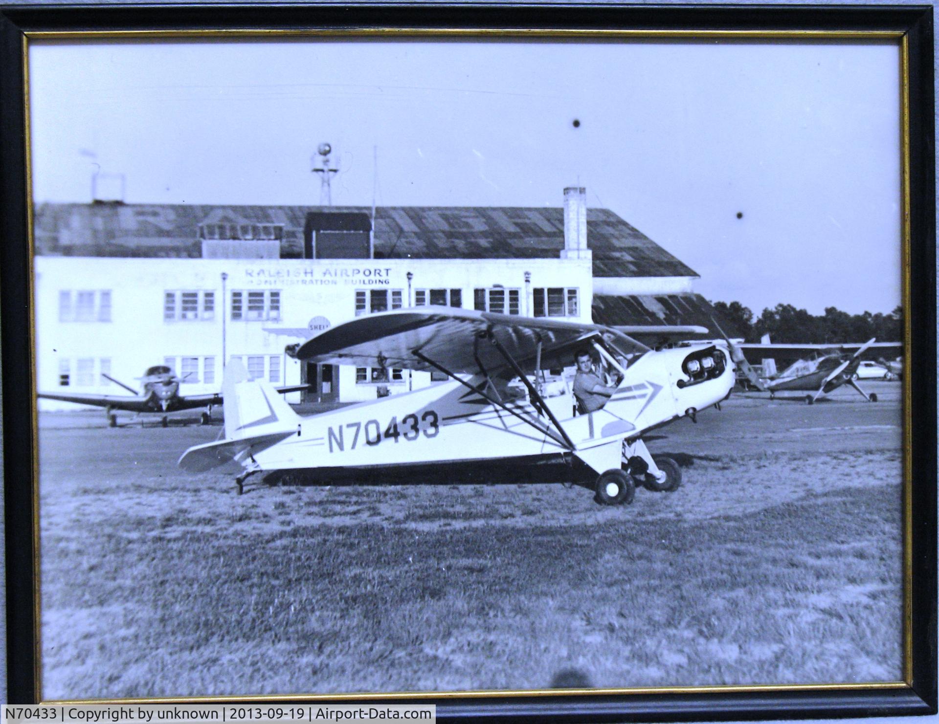 N70433, 1946 Piper J3C-65 Cub Cub C/N 17426, Alan Long in his Piper CJ
at the Raleigh Muni Airport
cira: about 1961