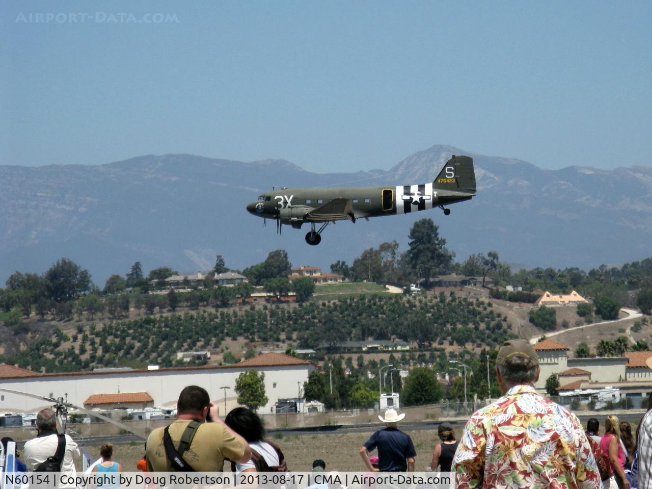 N60154, 1943 Douglas C-47B-25-DK Skytrain (Dakota III) C/N 16007/32755, 1943 Douglas DC-3C as C47B 'What's Up Doc?' two 1,200 Hp P&W R-1830-92s, opened the Airshow-parachute jump plane on final for landing Rwy 26. See CMA jumper photos.
