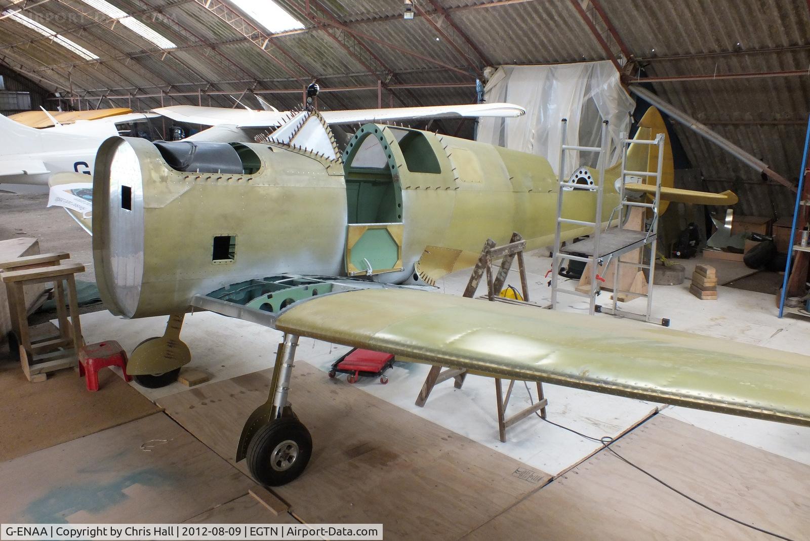 G-ENAA, 2013 Supermarine Aircraft Spitfire Mk.26B C/N LAA 324-15097, 2 seat Supermarine Spitfire MK26B under construction at Enstone Airfield. This is part of the ambitious plan by the Enstone Flying Club to build 12 Spitfire replicas and form a squadron which will display at airshows and events around the country.