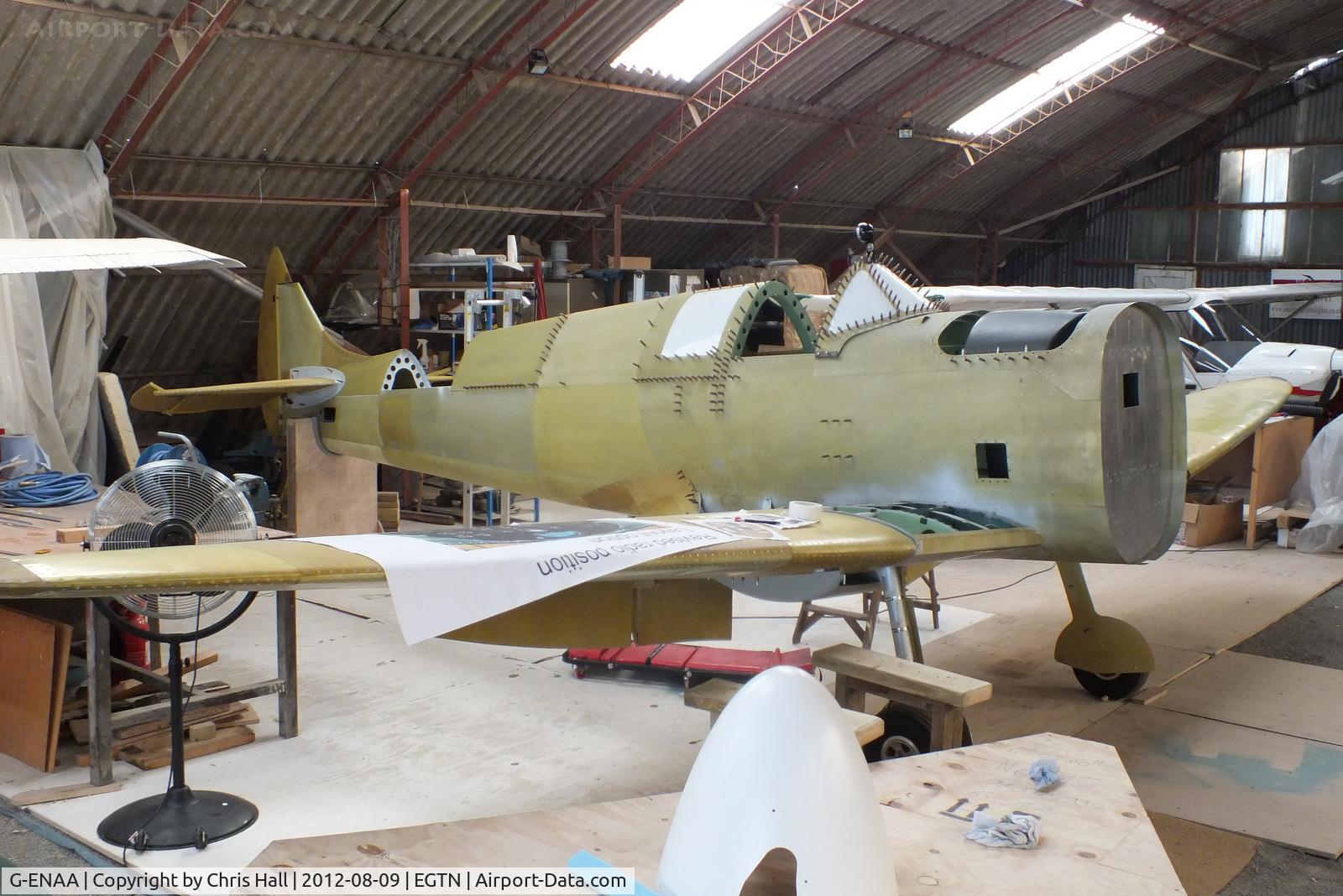 G-ENAA, 2013 Supermarine Aircraft Spitfire Mk.26B C/N LAA 324-15097, 2 seat Supermarine Spitfire MK26B under construction at Enstone Airfield. This is part of the ambitious plan by the Enstone Flying Club to build 12 Spitfire replicas and form a squadron which will display at airshows and events around the country.