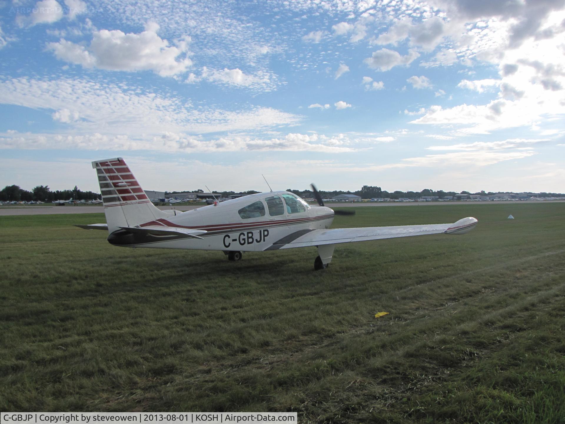 C-GBJP, 1964 Beech 35-B33 Debonair C/N CD-773, Grass taxiway ay Oshkosh