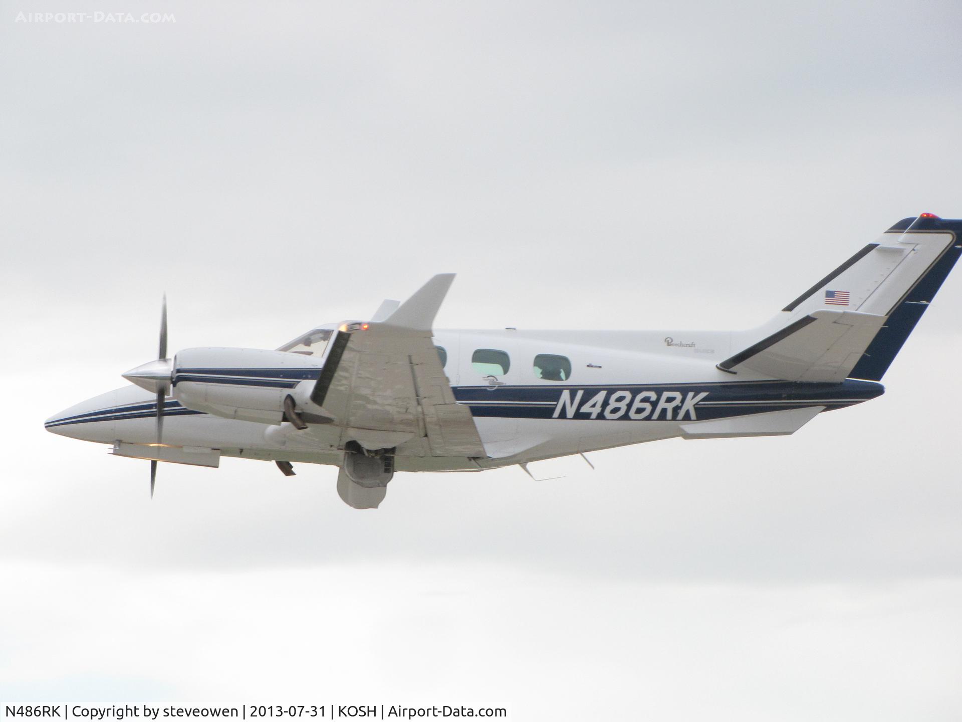 N486RK, 1978 Beechcraft B60 Duke C/N P-482, Departing Oshkosh