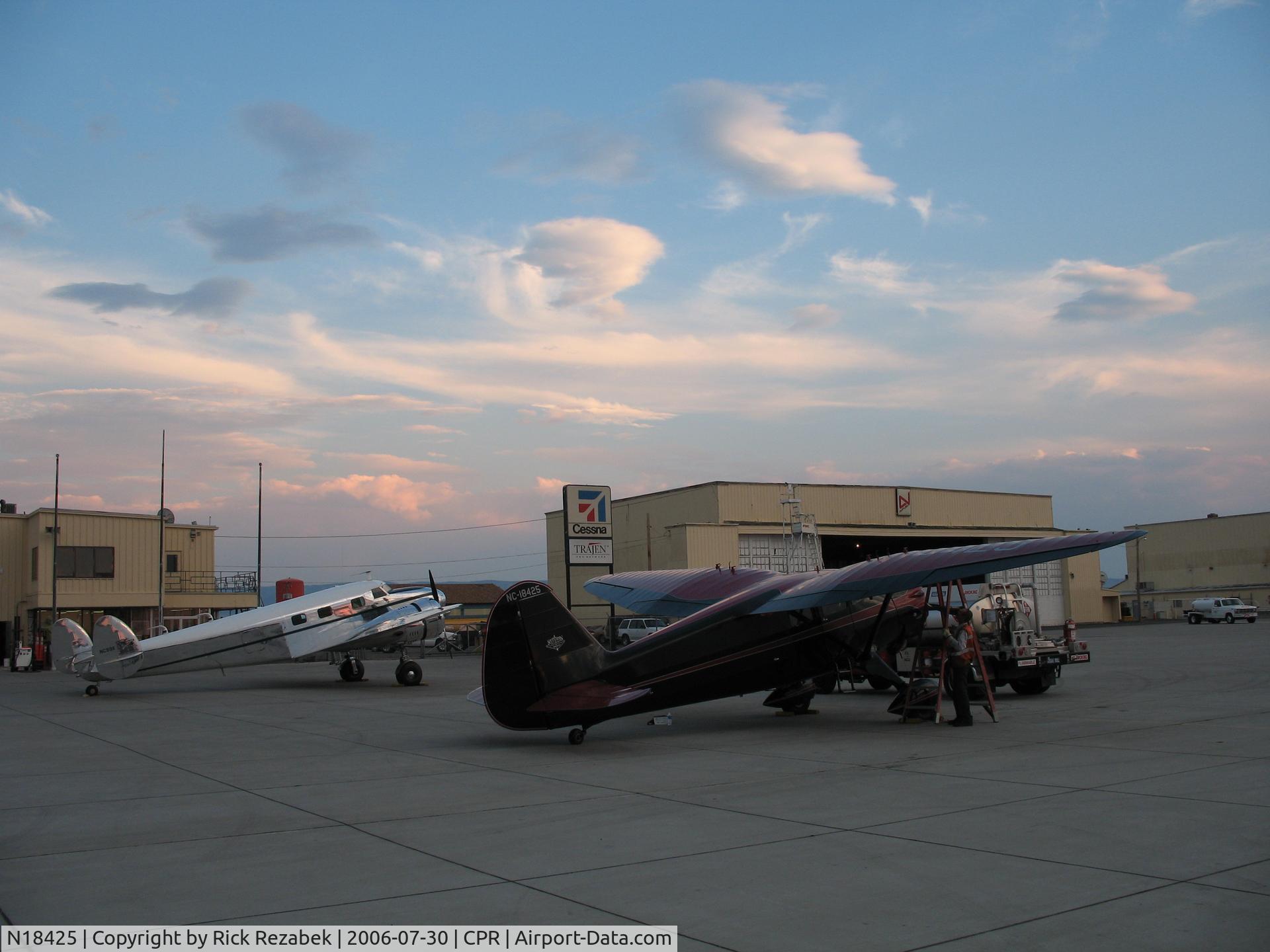N18425, 1937 Stinson SR-9F Reliant C/N 5715, Stinson SR-9F and Lockheed Model 12 Electra Jr at evening rest in Casper, WY on return from Oshkosh 2006.