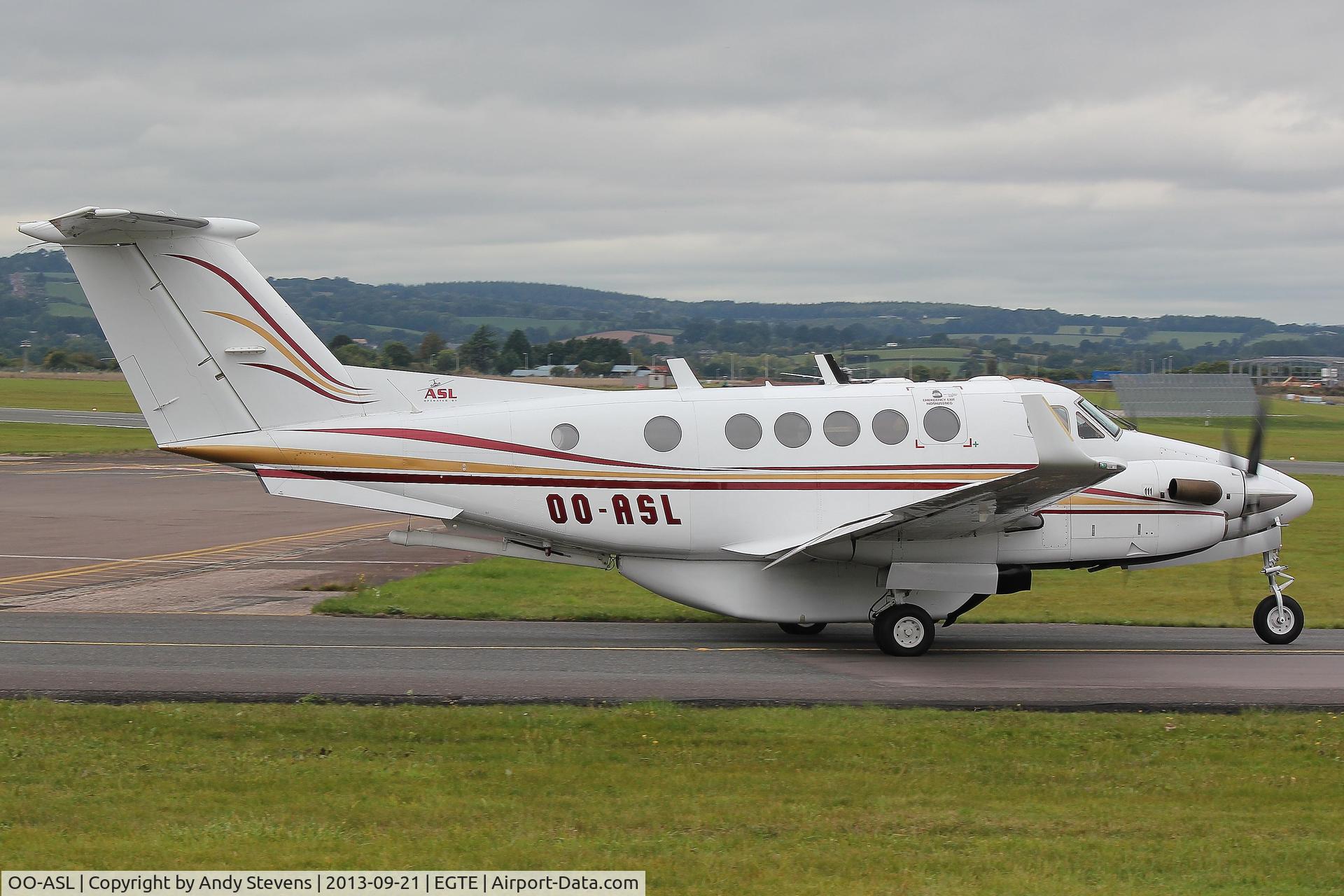 OO-ASL, 1982 Beech 200C Super King Air C/N BL-49, Taxiing for departure from R26 at Exeter