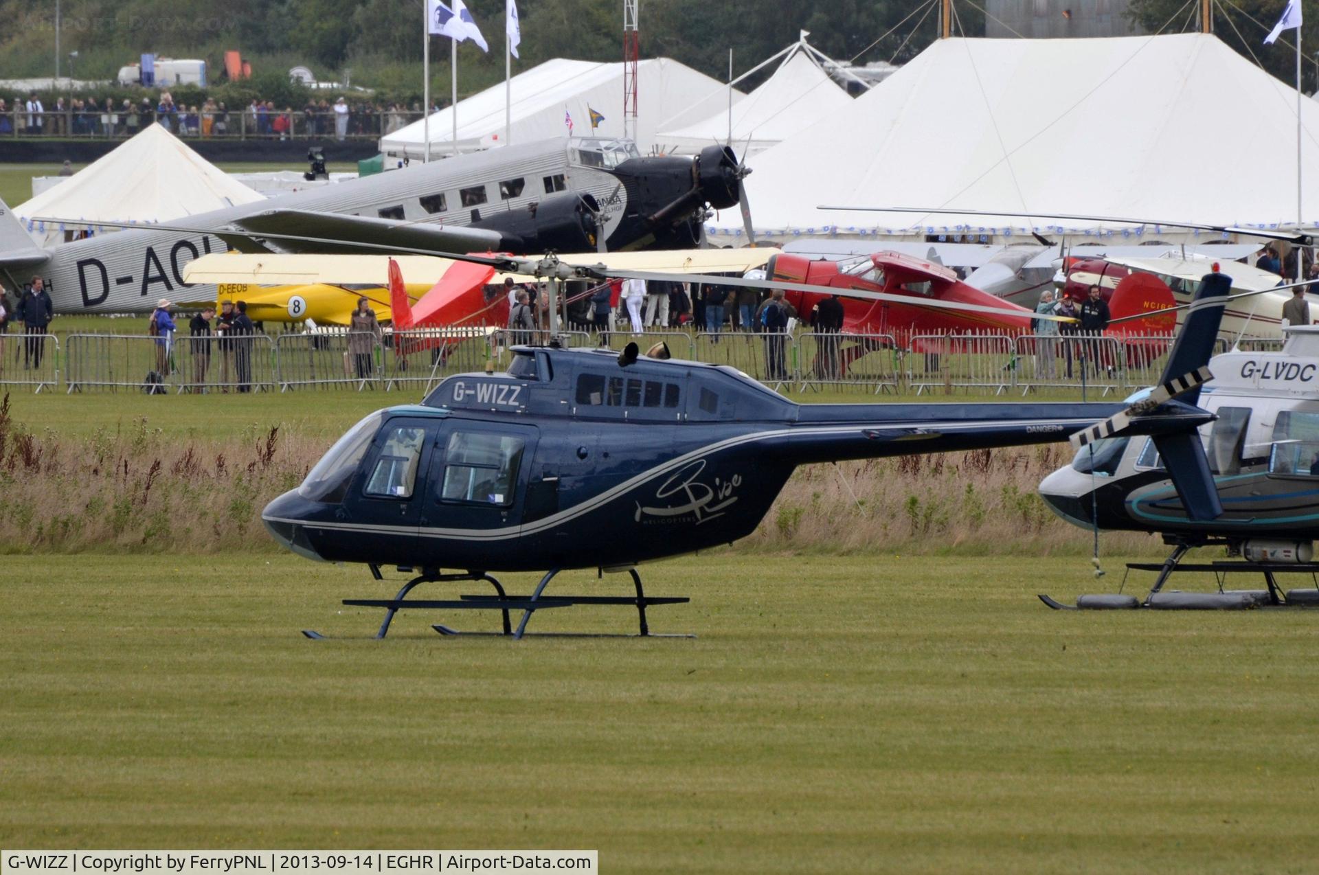 G-WIZZ, 1977 Agusta AB-206B JetRanger II C/N 8540, B206 resting in Goodwood